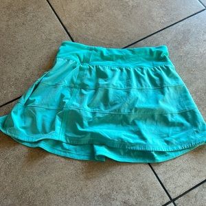 Acute skirt with shorts inside size 4